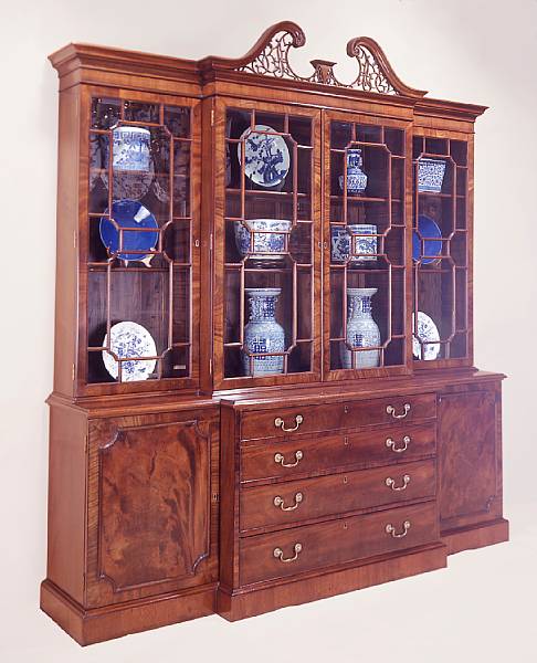 Appraisal: A wonderful George II style mahogany breakfront bookcase The pierced