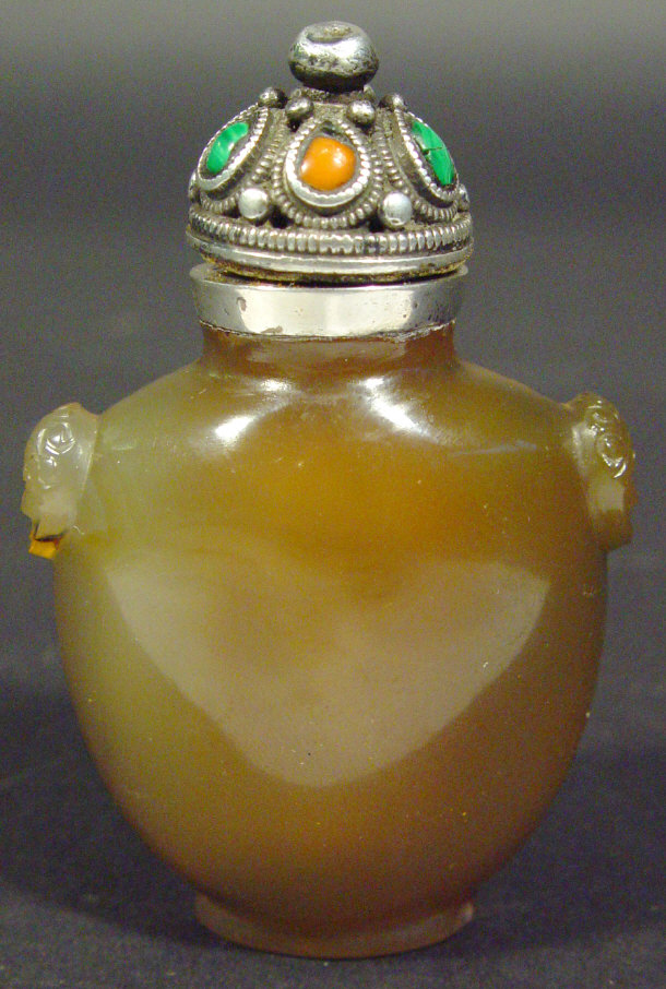 Appraisal: Chinese agate snuff bottle carved with mask handles and silver