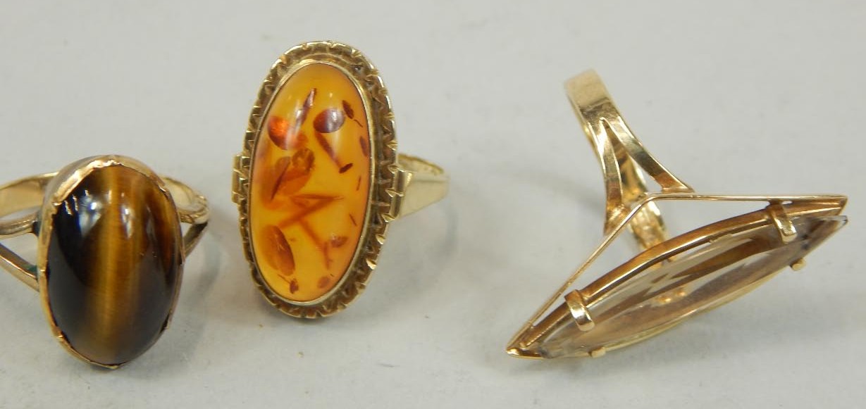 Appraisal: Three stone set dress rings two are ct hallmarked the