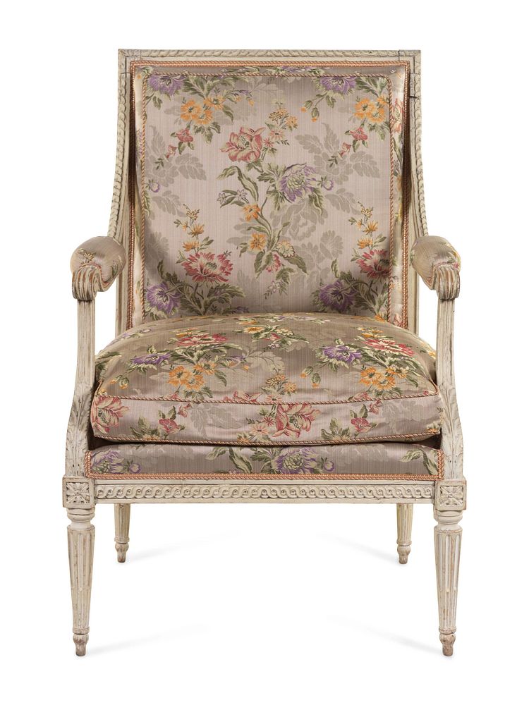 Appraisal: A Louis XVI Carved and White-Painted Fauteuil A Louis XVI