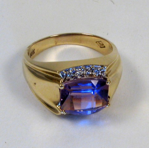 Appraisal: AMETHYST AND DIAMOND RING k gold and set with ten