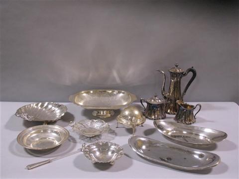 Appraisal: THREE PIECE AMERICAN SILVERPLATE DEMITASSE SET The slender set in