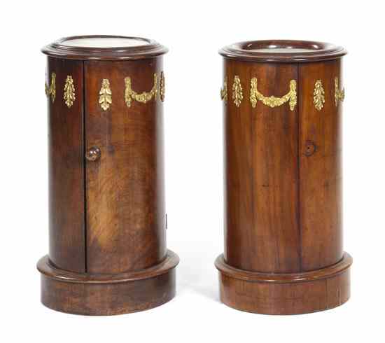 Appraisal: A Pair of Neoclassical Mahogany and Gilt Metal Mounted Pedestal