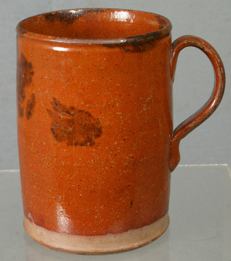 Appraisal: Manganese decorated redware mug minor glaze flakes otherwise very good