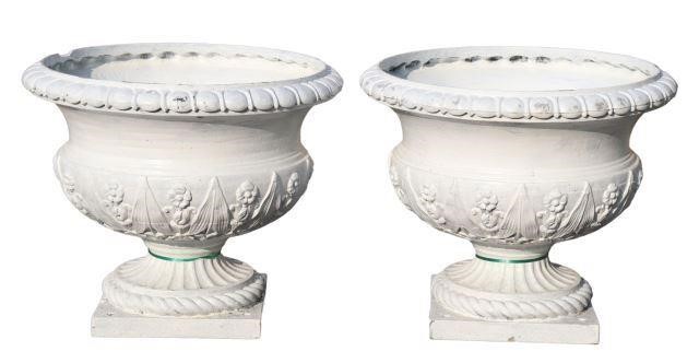 Appraisal: pair Architectural cast iron planters painted white with egg-and-dart rim