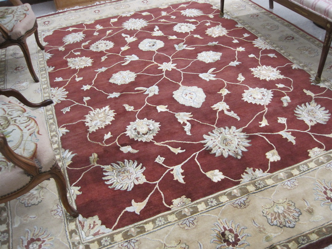 Appraisal: HAND KNOTTED ORIENTAL WOOL AND SILK CARPET Indo-Persian overall floral