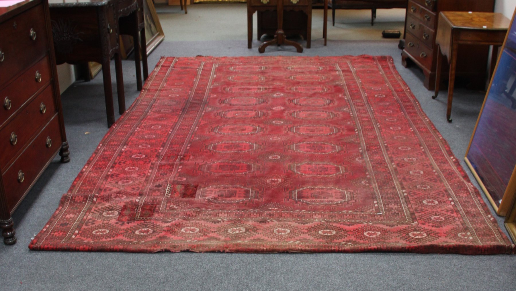 Appraisal: A large Eastern rug the two rows of elephant foot