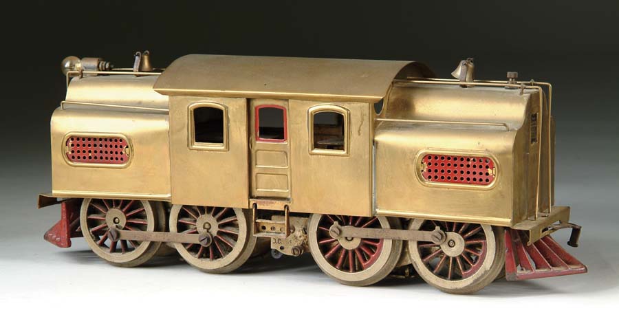 Appraisal: LIONEL STANDARD GAUGE BRASS Twin motored locomotive with thick rimmed