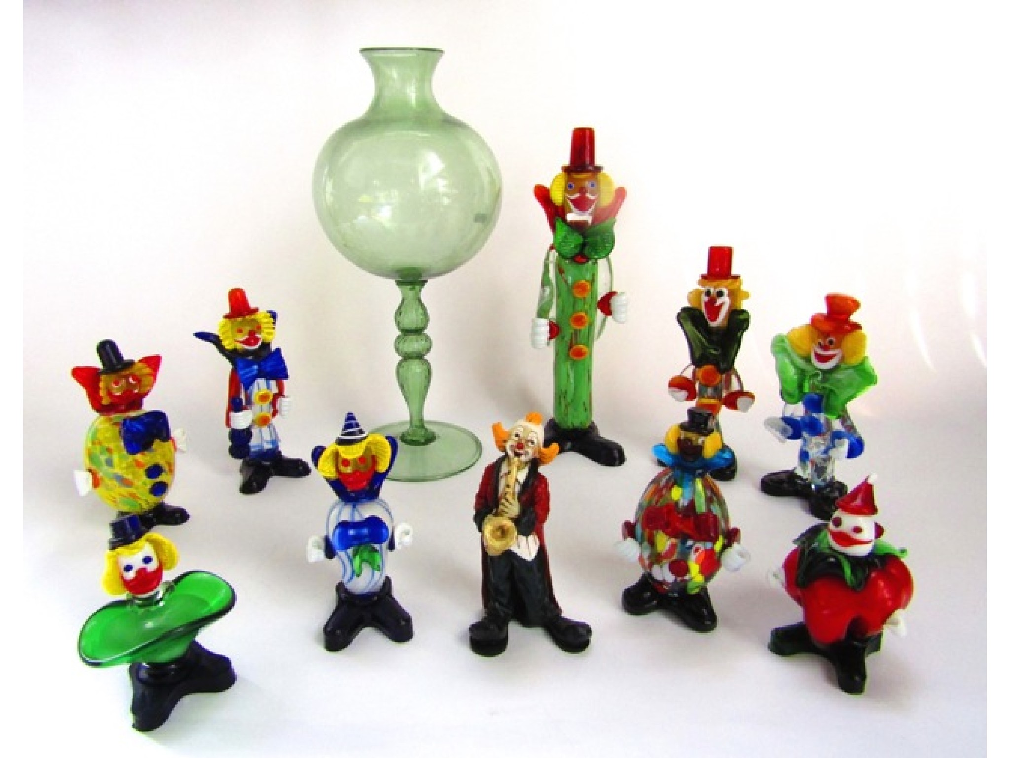 Appraisal: A collection of nine various Murano Glass clown figures the