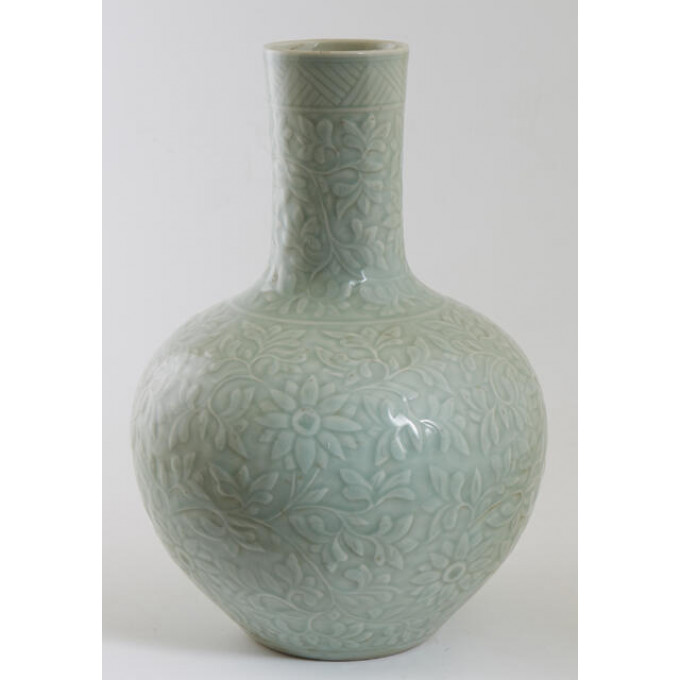 Appraisal: Chinese Celadon Porcelain Bottle Vase th c with relief floral