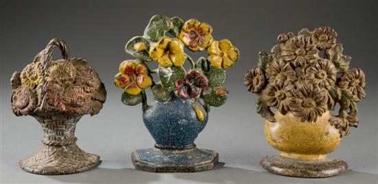 Appraisal: Group of three cast iron floral doorstops Late th early