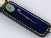 Appraisal: A mixed lot comprising a jade stick pin and a