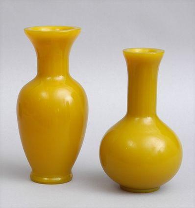 Appraisal: TWO PEKING YELLOW GLASS FOOTED VASES The larger of baluster-form