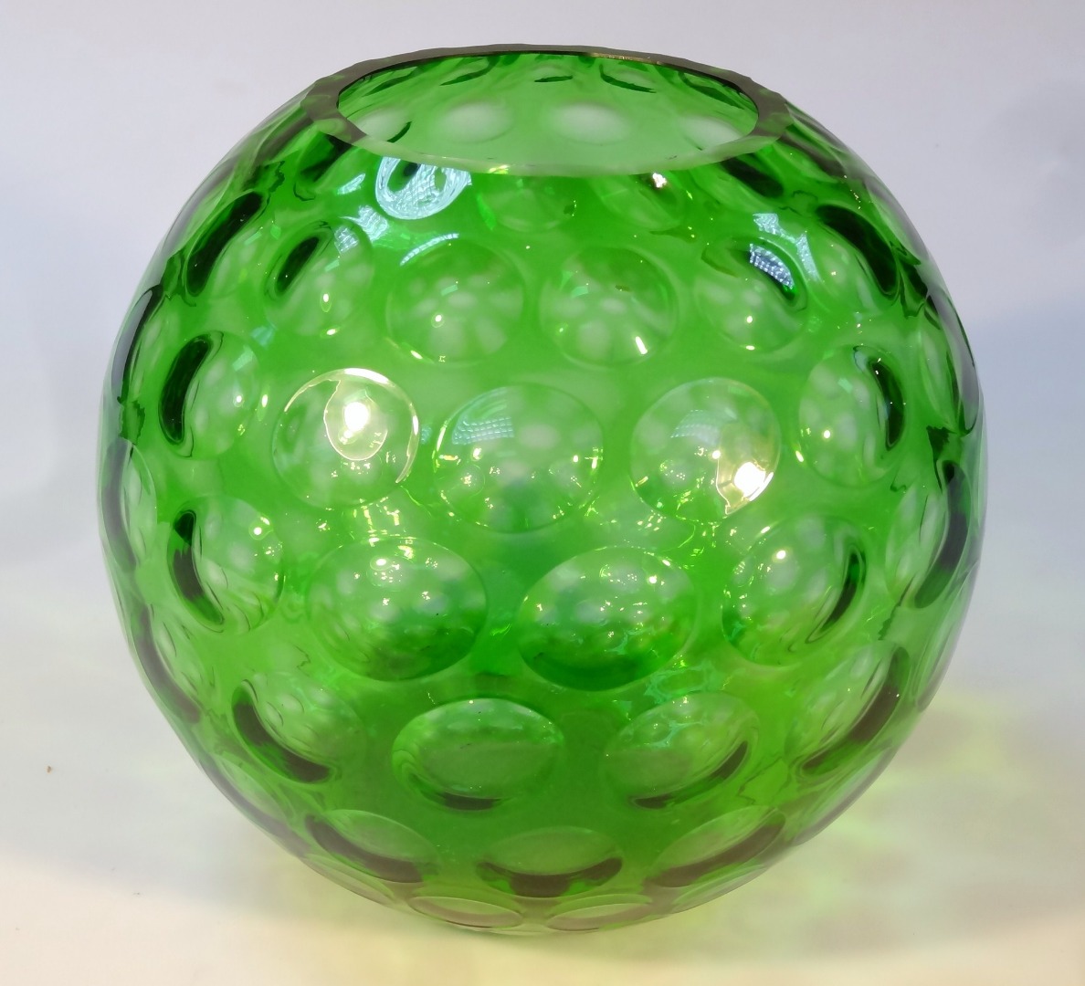 Appraisal: A mid- thC retro green glass bowl the circular body