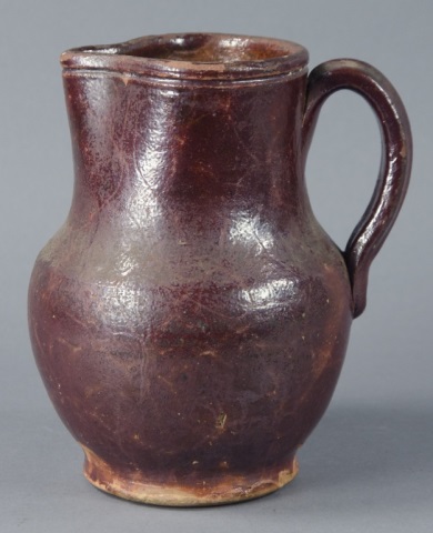 Appraisal: Redware Pitcher with HandleIn lead and manganese glaze with branch-like