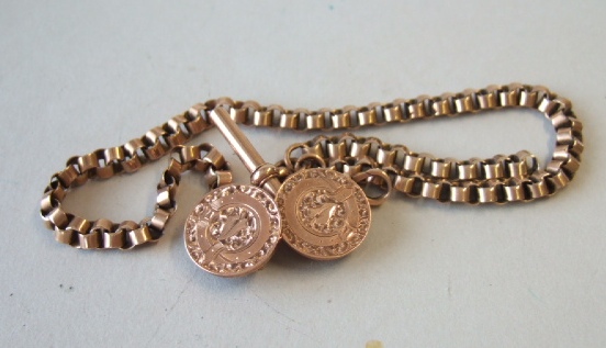 Appraisal: A gentleman's gold circular link watch Albert chain fitted with