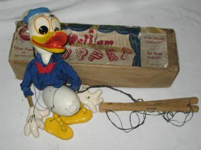 Appraisal: A Pelham Puppet Donald Duck in buff box with blue