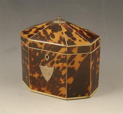 Appraisal: A George III octagonal tortoiseshell tea caddy with ivory stringing