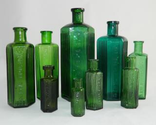 Appraisal: Green poison bottles Poison- green hexagonal all embossed 'Not To