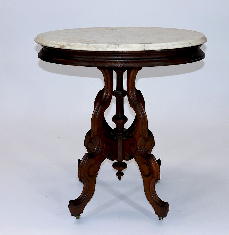 Appraisal: C Victorian Walnut Oval Marble Top Table United States Circa