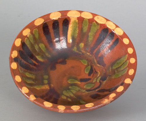 Appraisal: Pennsylvania redware bowl th c with yellow polka dot and