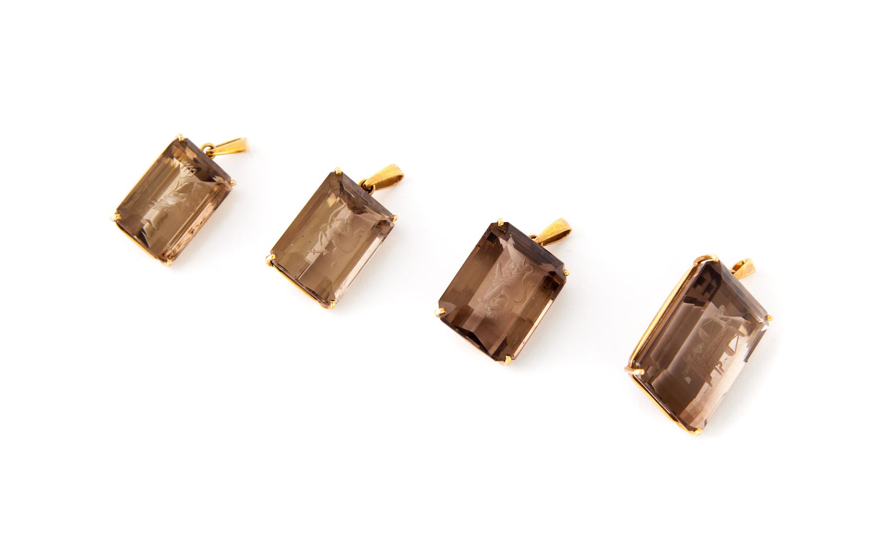 Appraisal: FOUR REVERSE CARVED SMOKY QUARTZ PENDANTS American st century Group