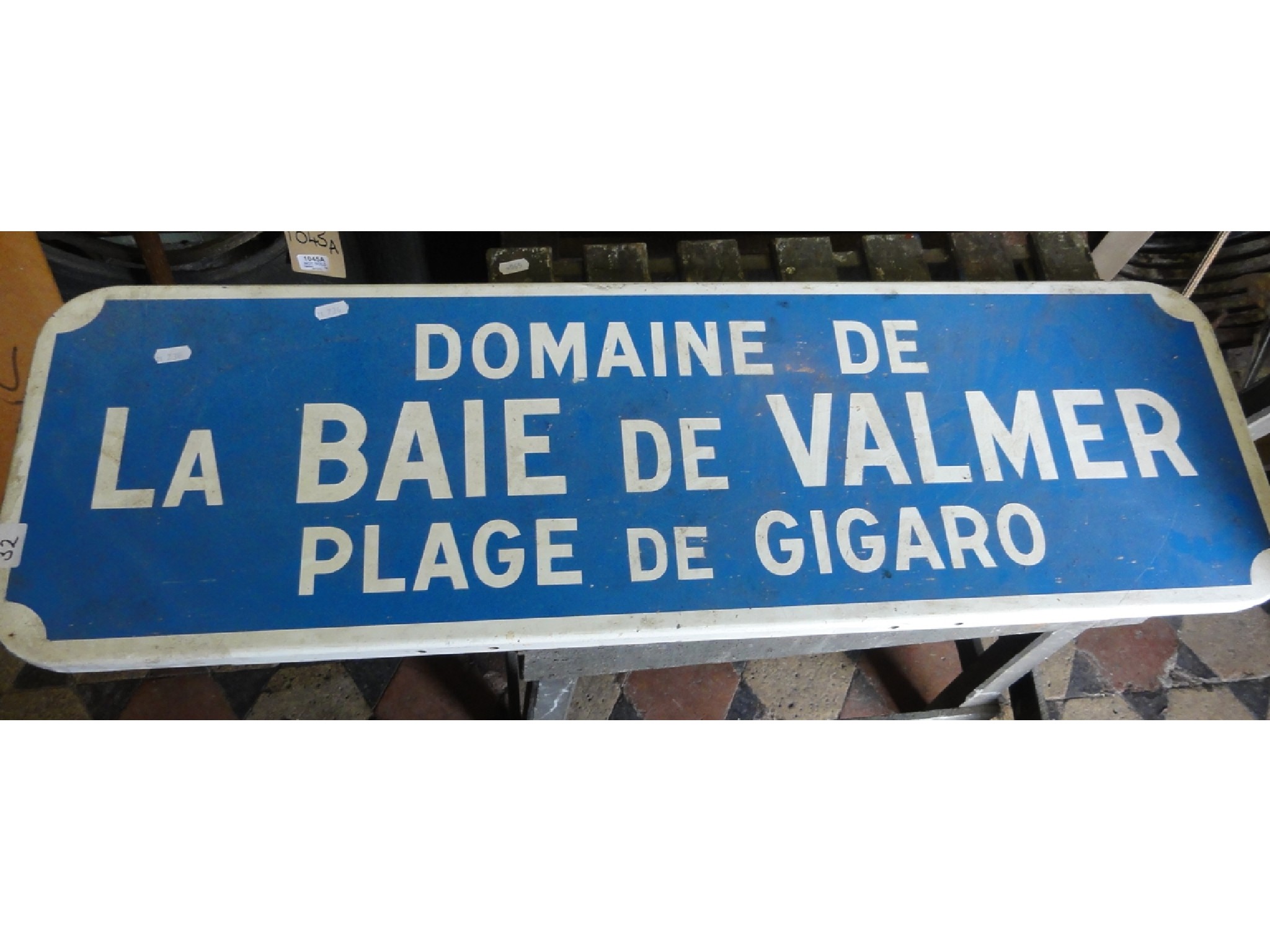 Appraisal: A reclaimed French painted steel sign of rectangular form with