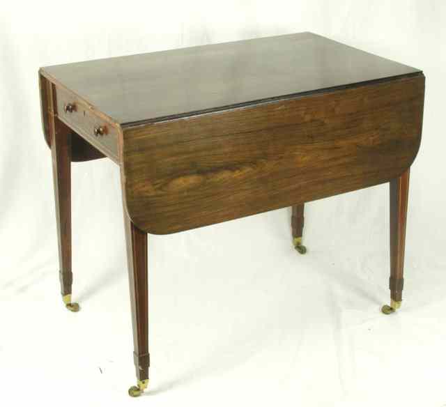 Appraisal: A th Century rosewood two-flap Pembroke table fitted a drawer