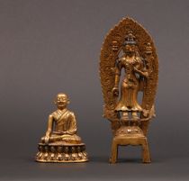 Appraisal: Two Tibetan-Nepalese Figures ca th- th Century Two gilt bronze