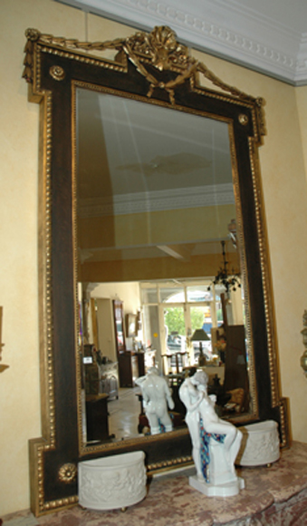 Appraisal: A FRENCH EMPIRE STYLE POLYCHROME AND GILT WOOD WALL MIRROR