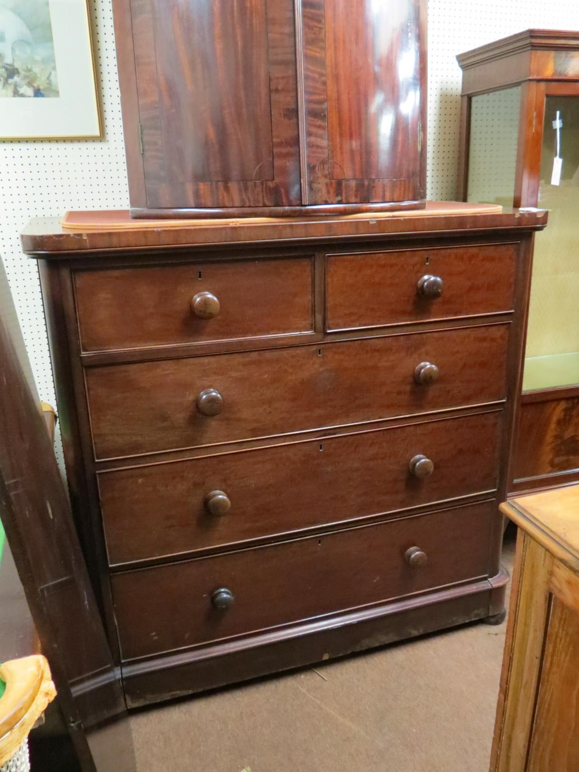 Appraisal: A Victorian mahogany chest two short and three long oak-lined