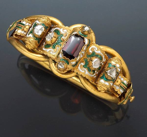 Appraisal: An antique diamond garnet and enamel bangle bracelet circa featuring