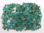 Appraisal: A quantity of loose polished emeralds mixed cuts approx carats