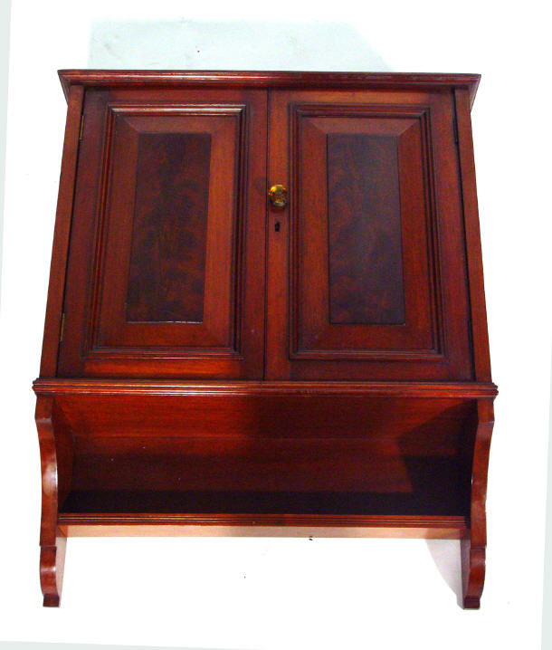 Appraisal: Victorian mahogany hanging two door cupboard fitted a shelf to