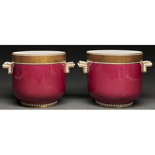 Appraisal: A pair of claret ground Staffordshire bone china jardini res