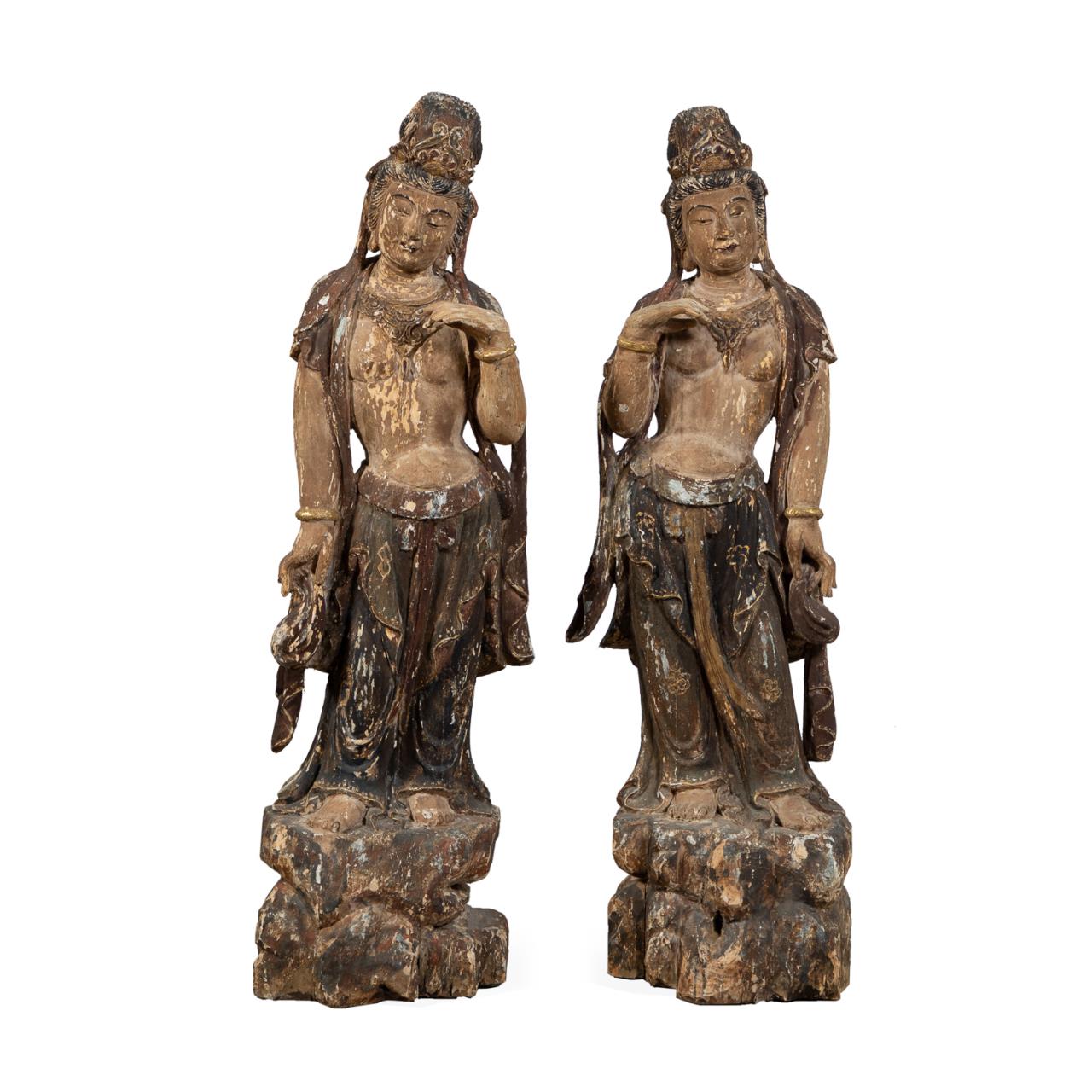 Appraisal: PAIR HAND CARVED WOOD STANDING GUAN YIN FIGURES Pair of