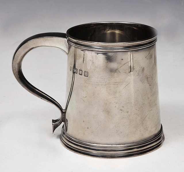 Appraisal: A SILVER SMALL TANKARD of plain slightly tapered form by