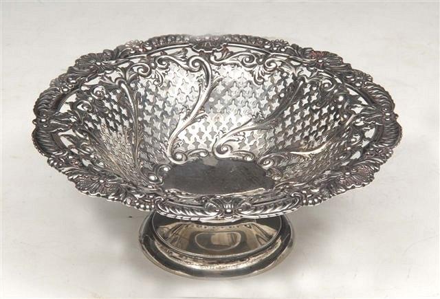 Appraisal: AN EDWARDIAN SILVER BON-BON DISH the bowl pierced with star