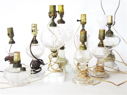 Appraisal: Nine uncolored pressed glass fluid lamps th century