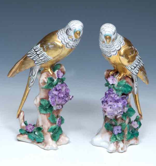 Appraisal: A PAIR OF PORCELAIN FIGURES each in the form of