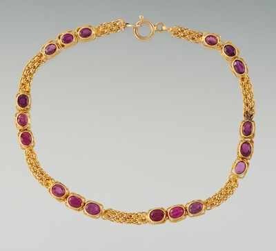 Appraisal: A Ladies' Gold and Ruby Bracelet k yellow gold articulated