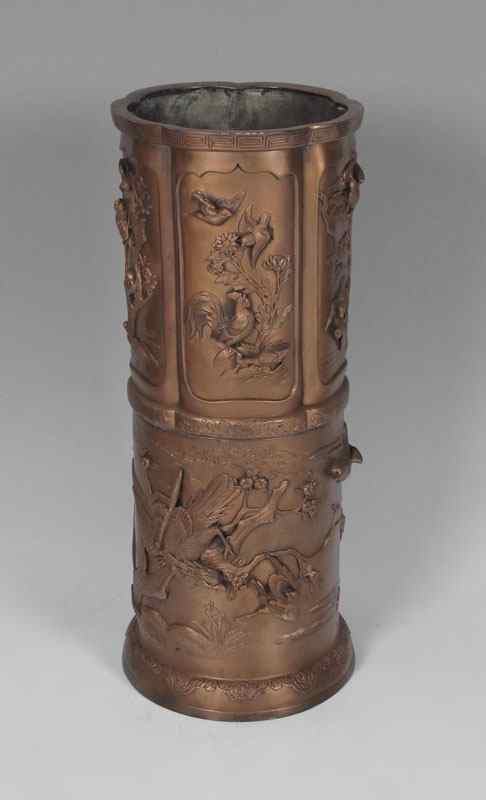 Appraisal: JAPANESE BRONZE UMBRELLA STAND Tall lobed form deeply embossed bird