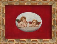 Appraisal: FRAMED OVAL PORCELAIN HAND PAINTED PLAQUE Scene shows two cherubs