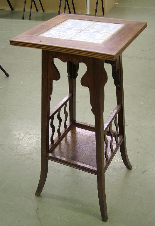 Appraisal: Arts Crafts oak plant stand the square tiled top upon