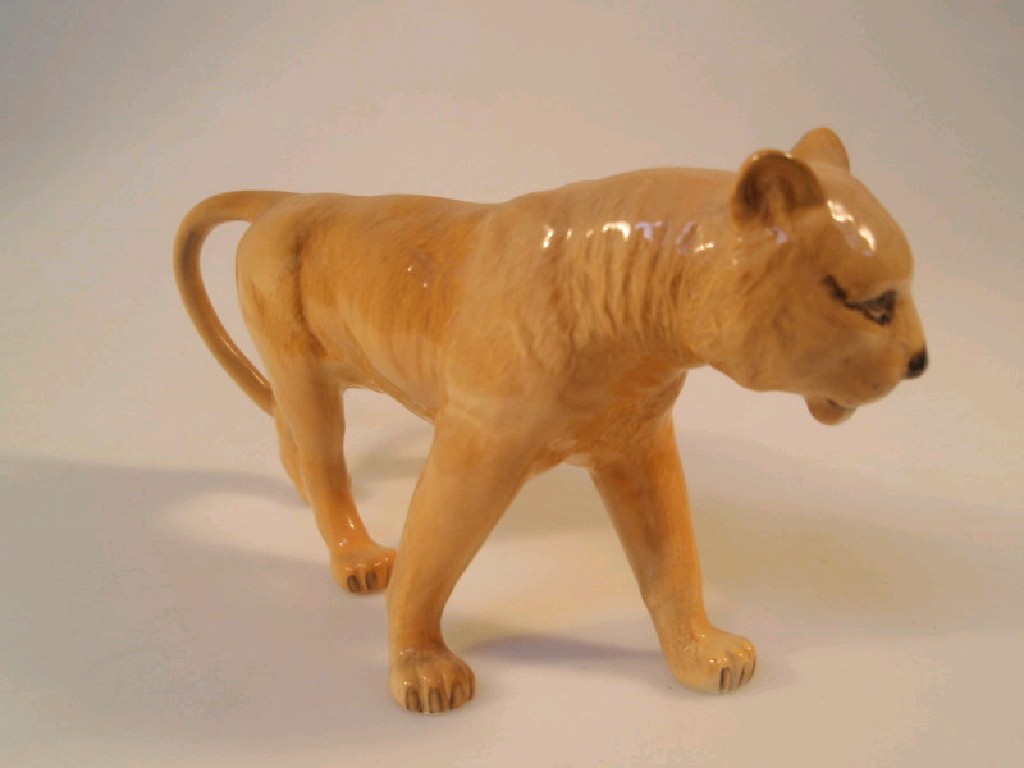 Appraisal: A Beswick figure of a lioness high