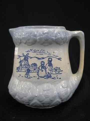 Appraisal: Blue Decorated Stoneware Pottery Pitcher Dutch scene with raised floral