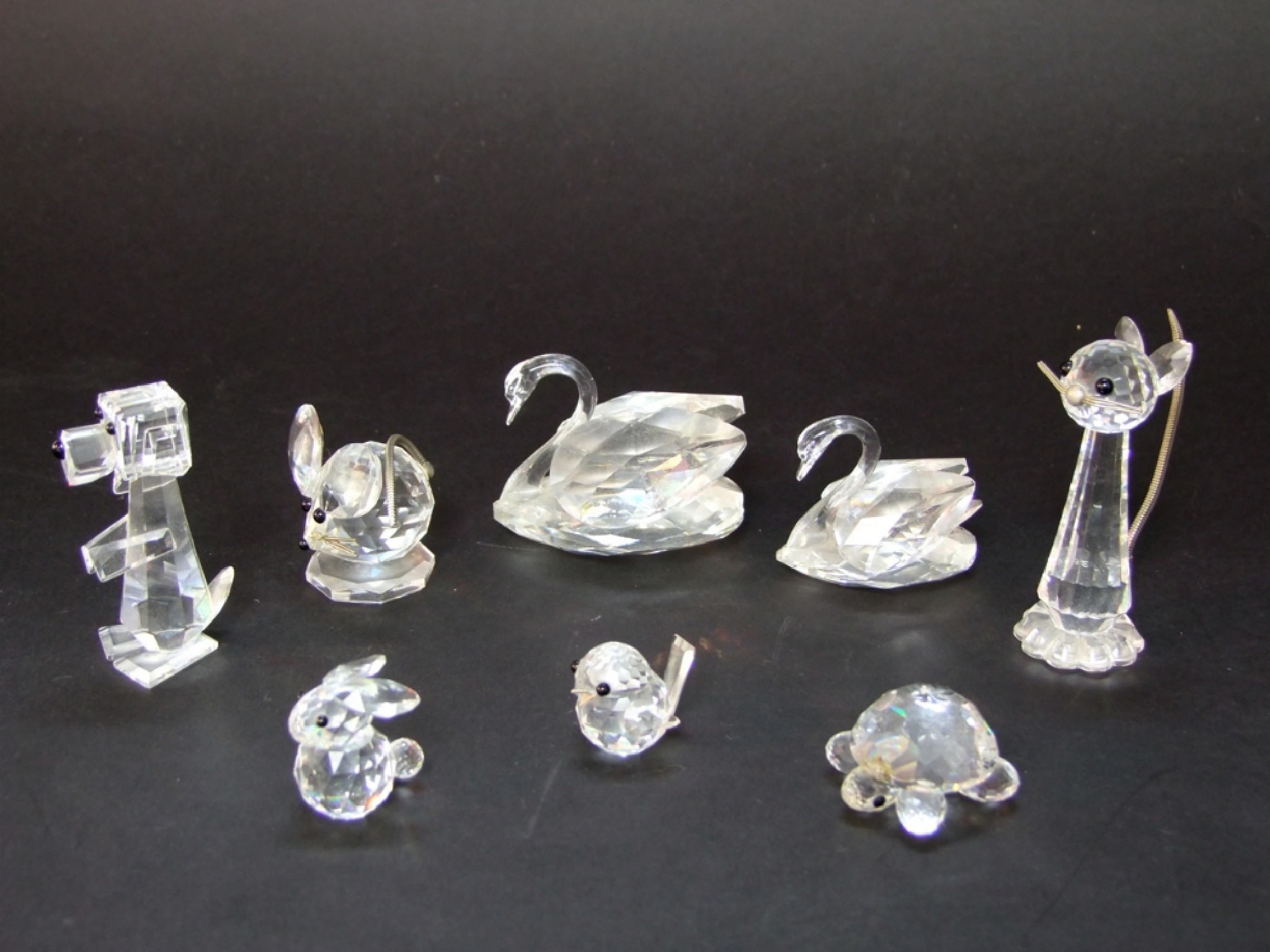 Appraisal: A collection of Swarovski crystal animal figures to include one