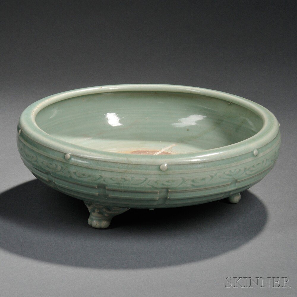 Appraisal: Tripod Celadon Censer China Yuan Dynasty style decorated with a