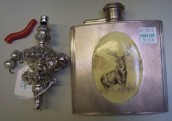 Appraisal: A silver spirit flask the front decorated with a stag