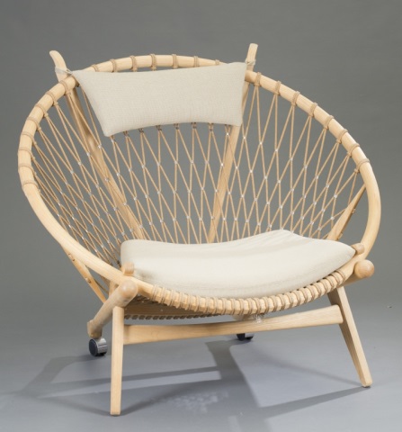 Appraisal: Hans Wegner Circle Chair Solid oak with woven flag line